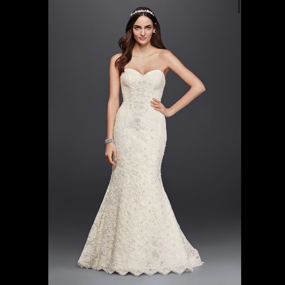 Oleg Cassini trumpet lace wedding gown